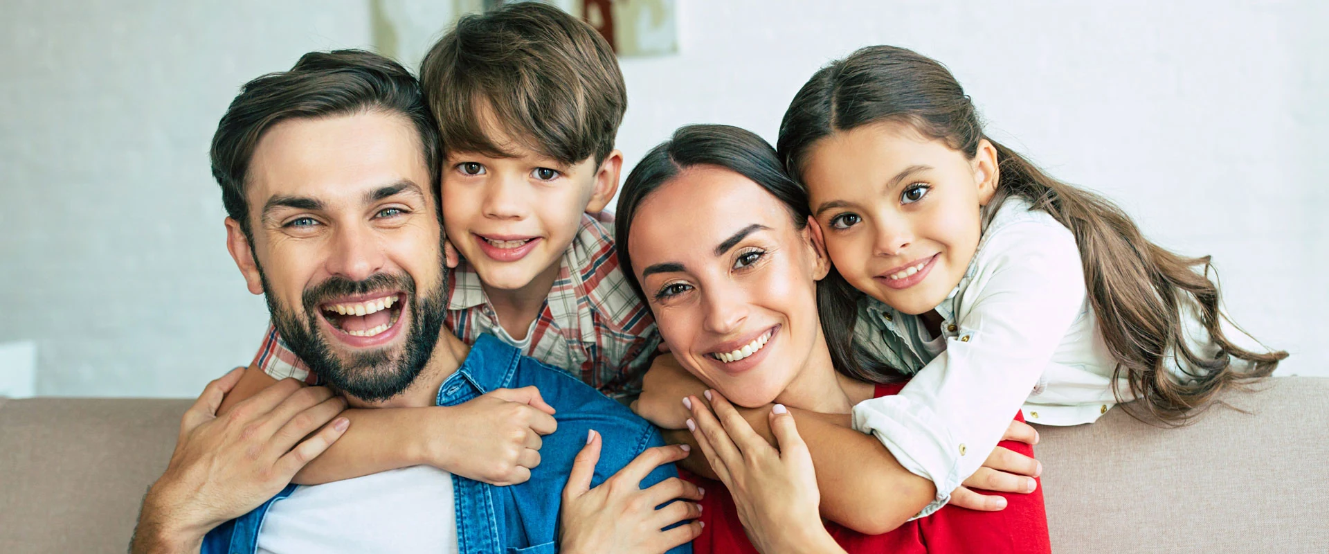 Family smiling — dental services at Sundent Family Dental Etobicoke